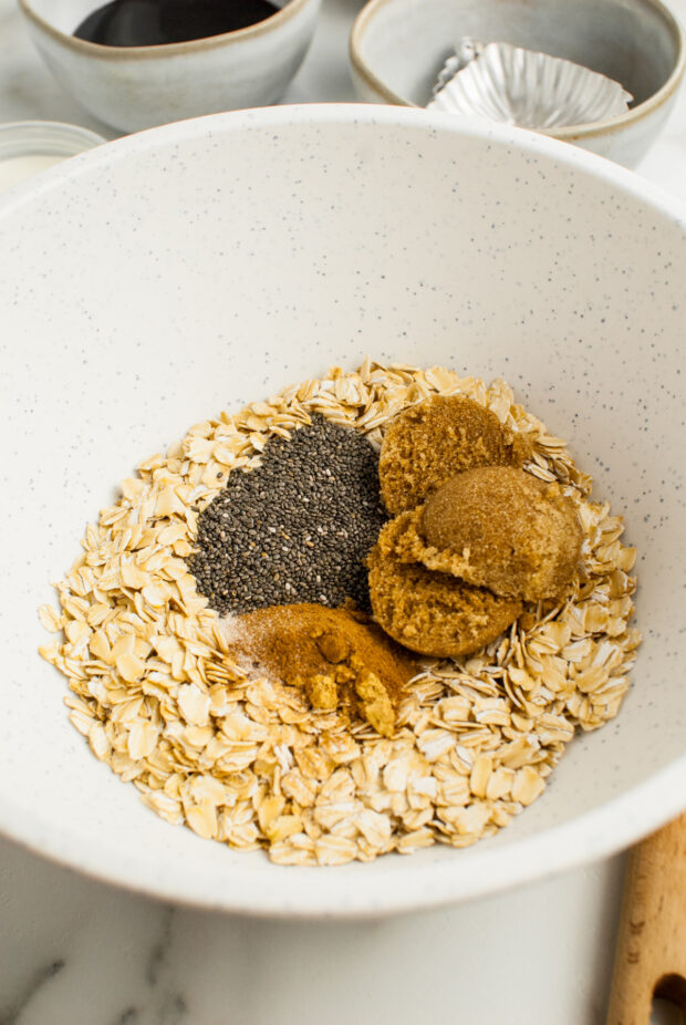 Dry ingredients for baked oatmeal in a bowl. 
