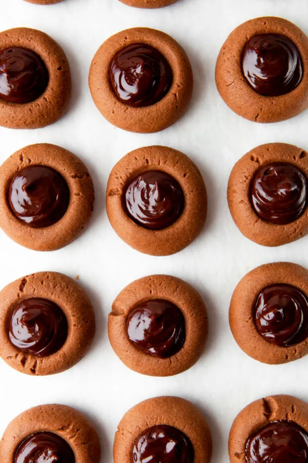 Double Chocolate Thumbprint Cookies sitting in a row. 