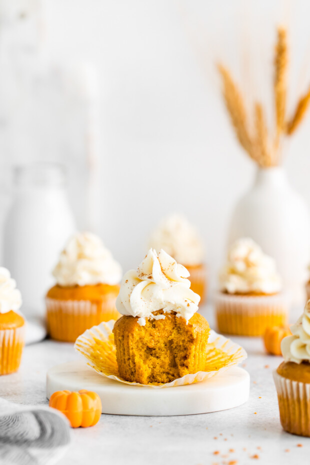Pumpkin Pie Cupcakes with a bite taken out of the center. 