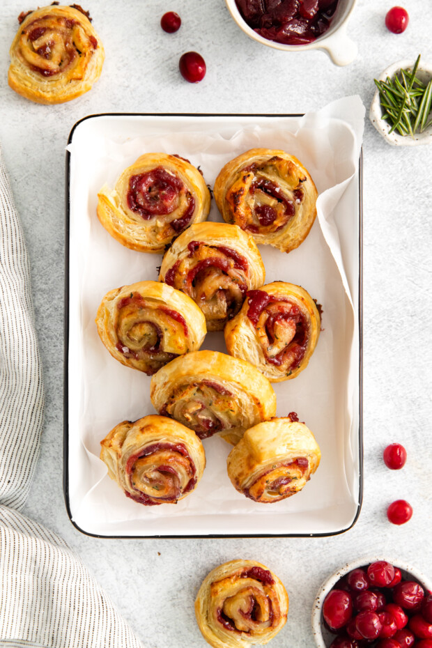 Cranberry Brie Pinwheels on a serving tray. 