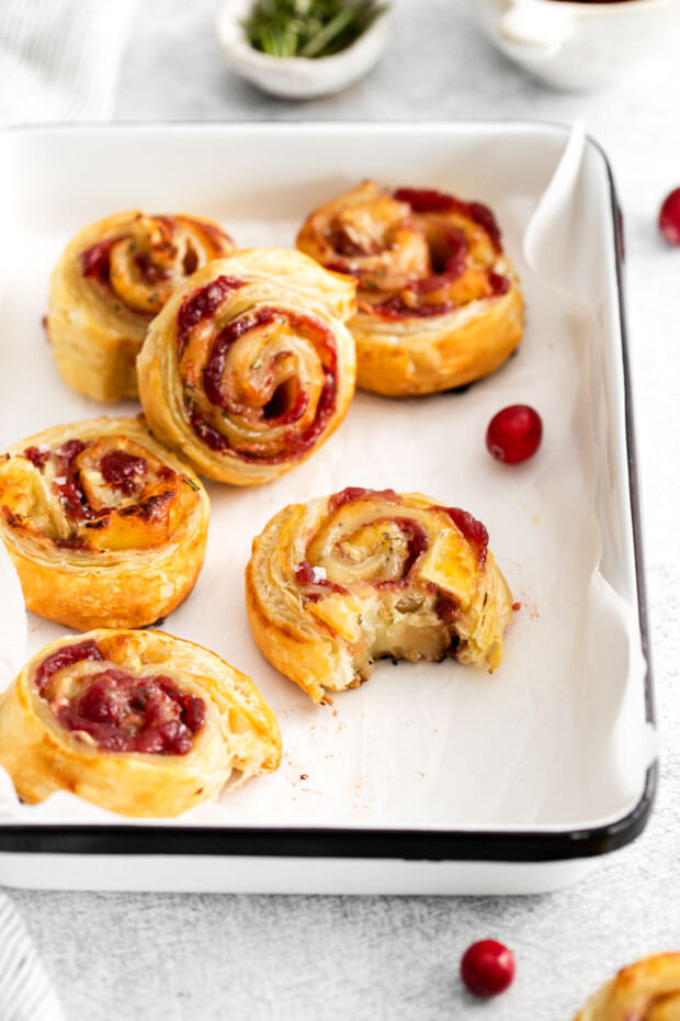 Cranberry Brie Pinwheels with a bite take out of it. 