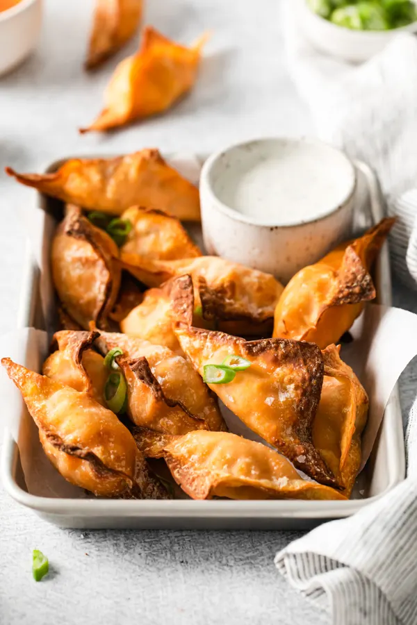 Air Fryer Buffalo Chicken Wontons in a tray for serving. 