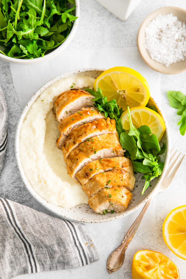 Air Fryer Lemon Chicken served with mashed potatoes. 