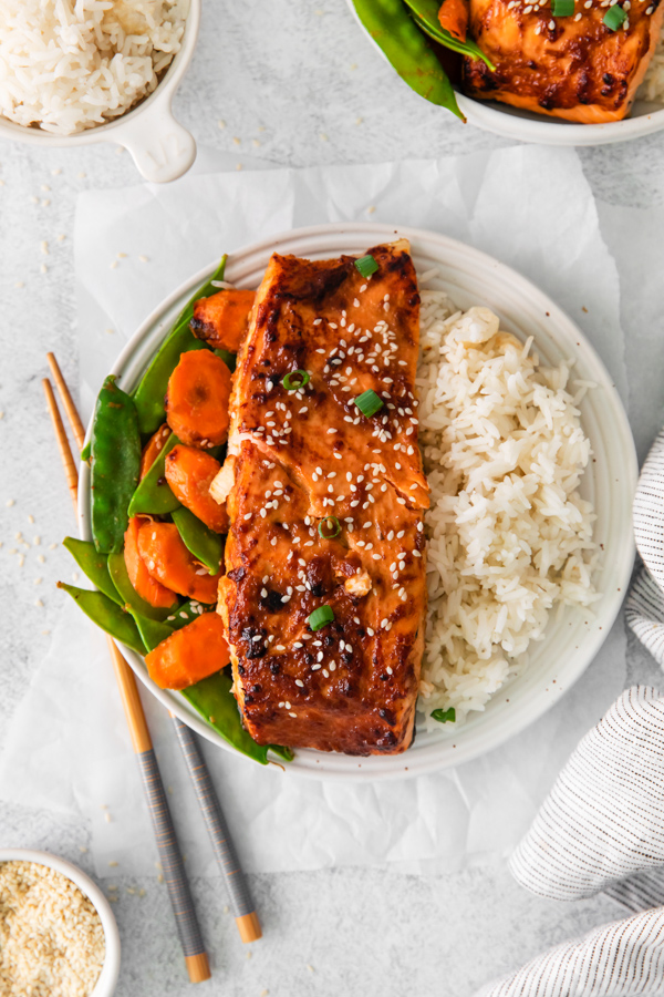 Air Fryer Miso Salmon on a plate with rice. 