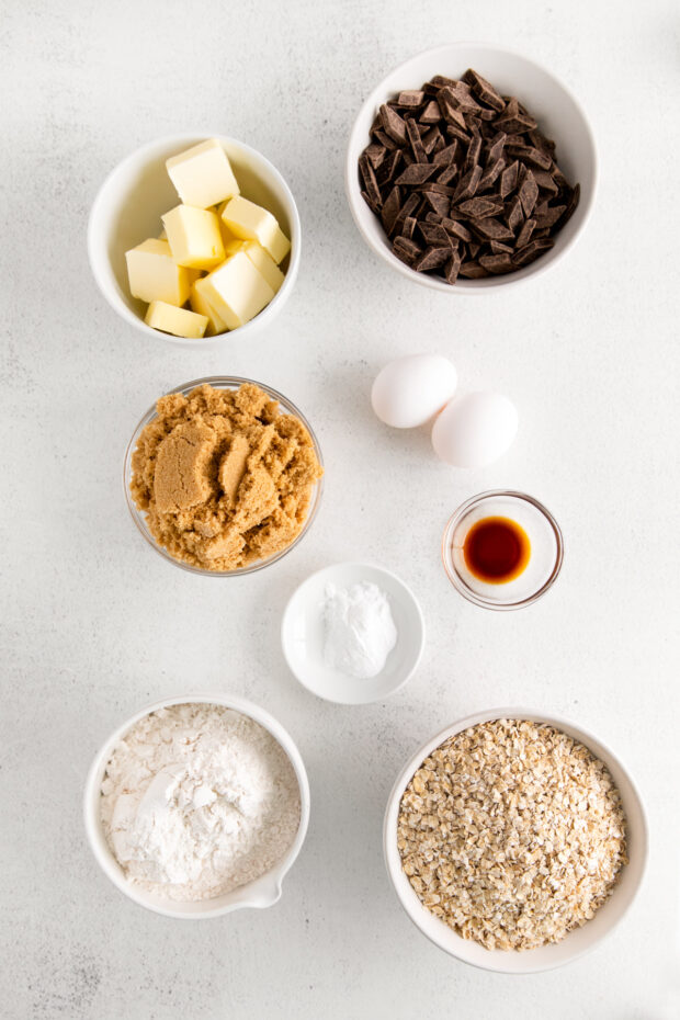 Chocolate Chunk Oatmeal Cookie Bar ingredients on a table. 