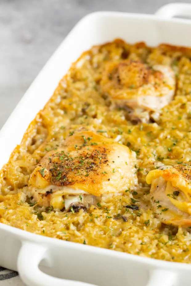 Easy Chicken and Rice Casserole topped with parsley.