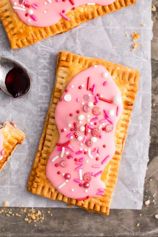 Air Fryer Pop Tarts topped with sprinkles. 