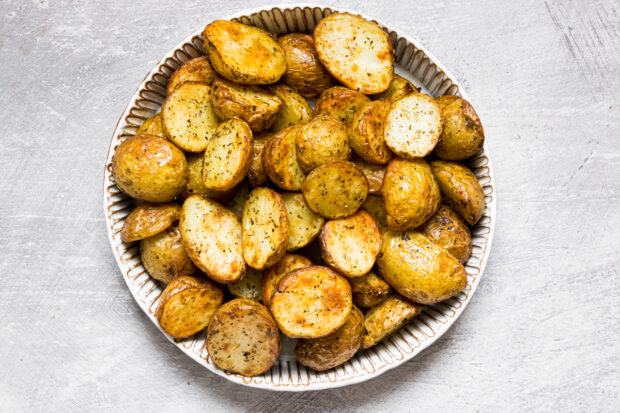 Air Fryer Roasted Potatoes on a white plate. 