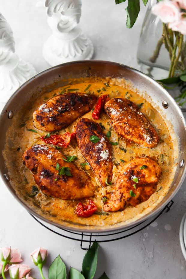 Creamy Tuscan Chicken served with rice. 
