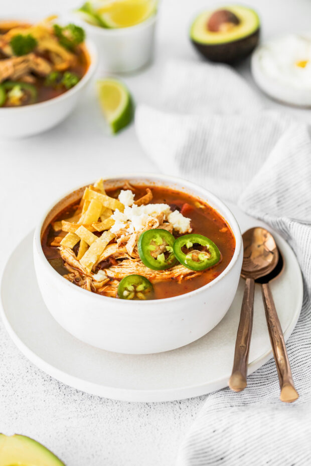 Instant Pot Chicken Tortilla Soup served with jalapeno slices. 