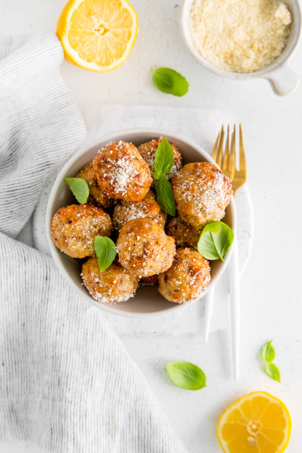 Air Fryer Chicken Meatballs in a white serving bowl. 