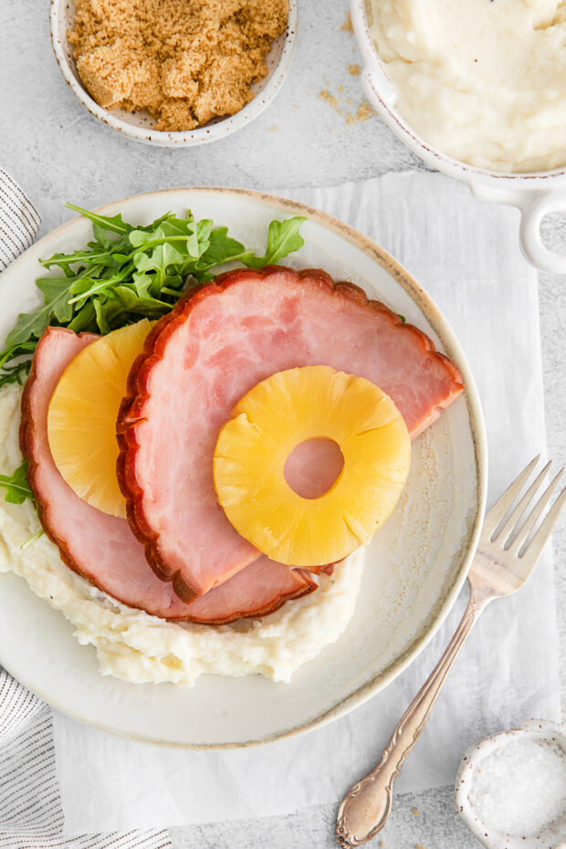 3-Ingredient Instant Pot Ham served with pineapple. 