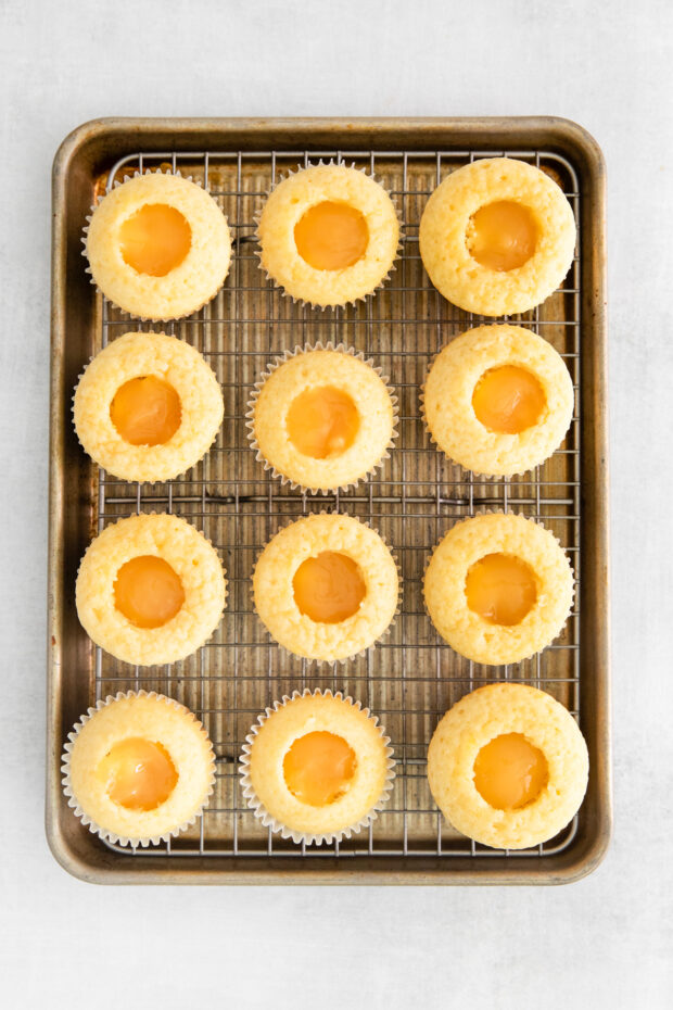Lemon cupcakes filled with lemon curd. 