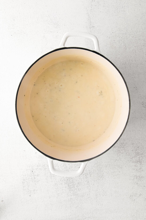 Cheese sauce in a dutch oven. 