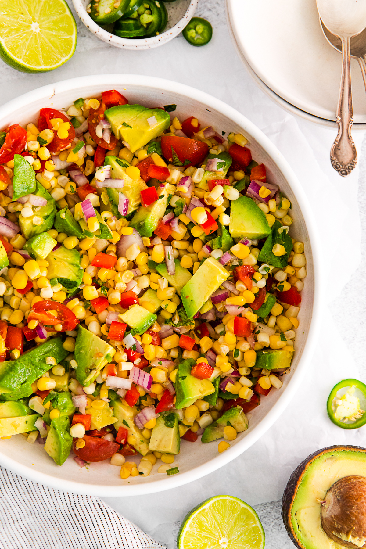 Avocado Corn Salad served with a lime dressing. 