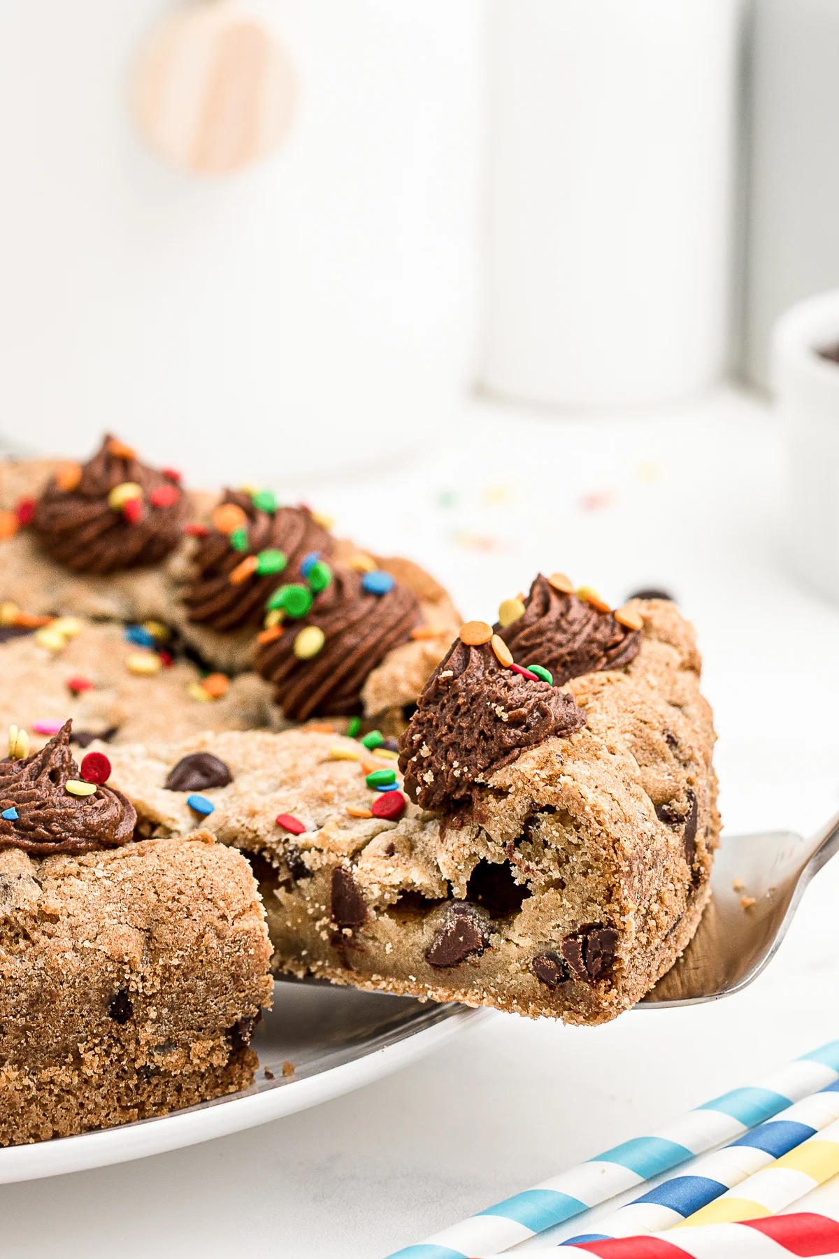 A sliced of Chocolate Chip Cookie Cake. 
