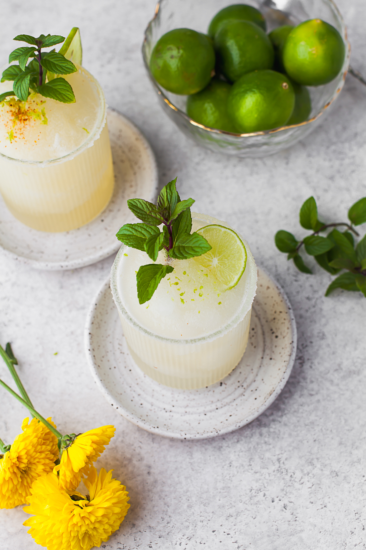 Classic Margarita served with mint and lime. 