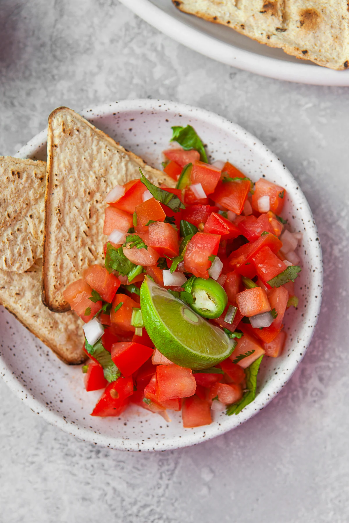 Pico de Gallo served with chips. 