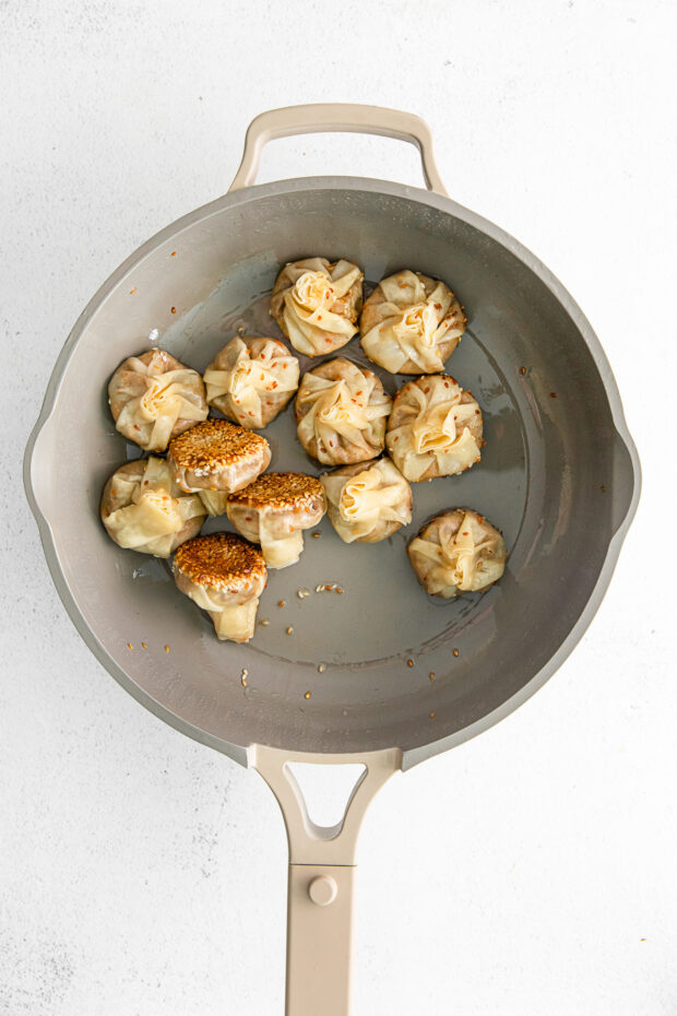 Cooked dumplings in a pan. 