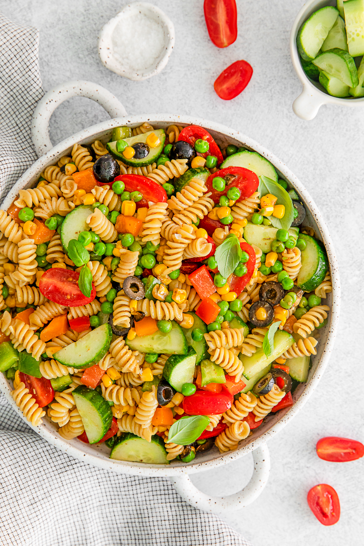 Summer Pasta Salad topped with extra fresh basil. 