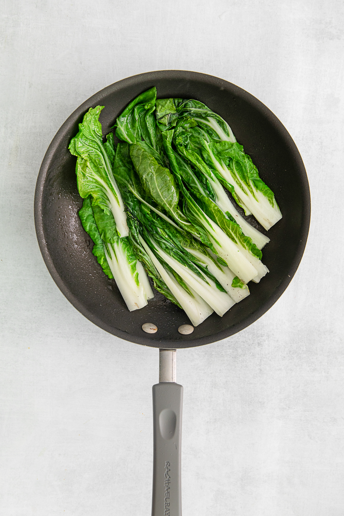 Bok choy in a skillet. 