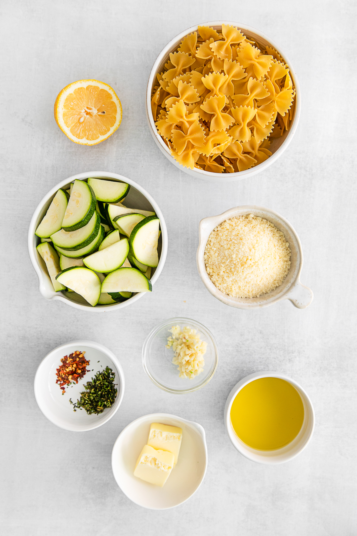 ingredients to make Lemon Zucchini Pasta on a table. 