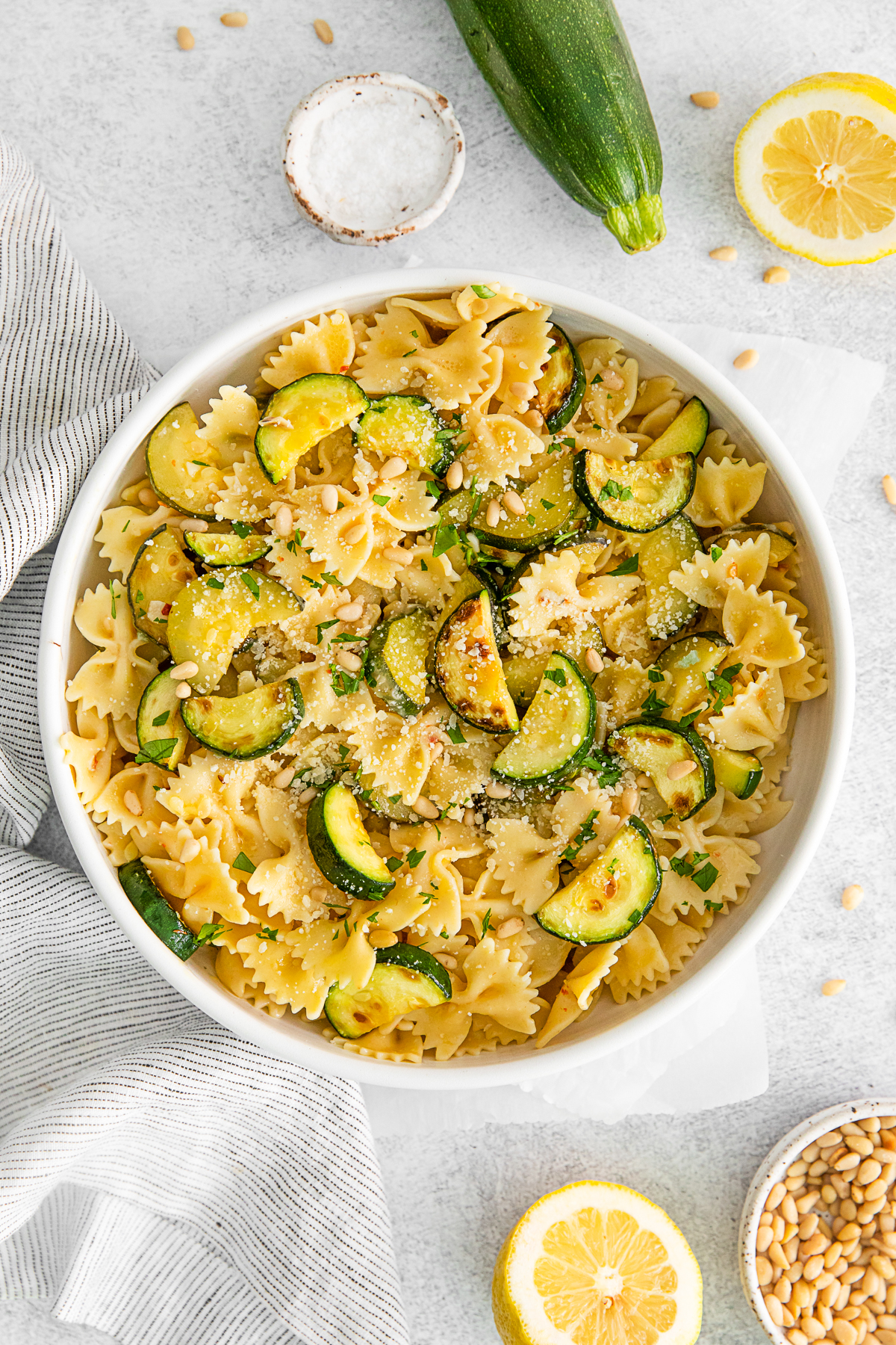 Lemon Zucchini Pasta sprinkled with parmesan cheese. 