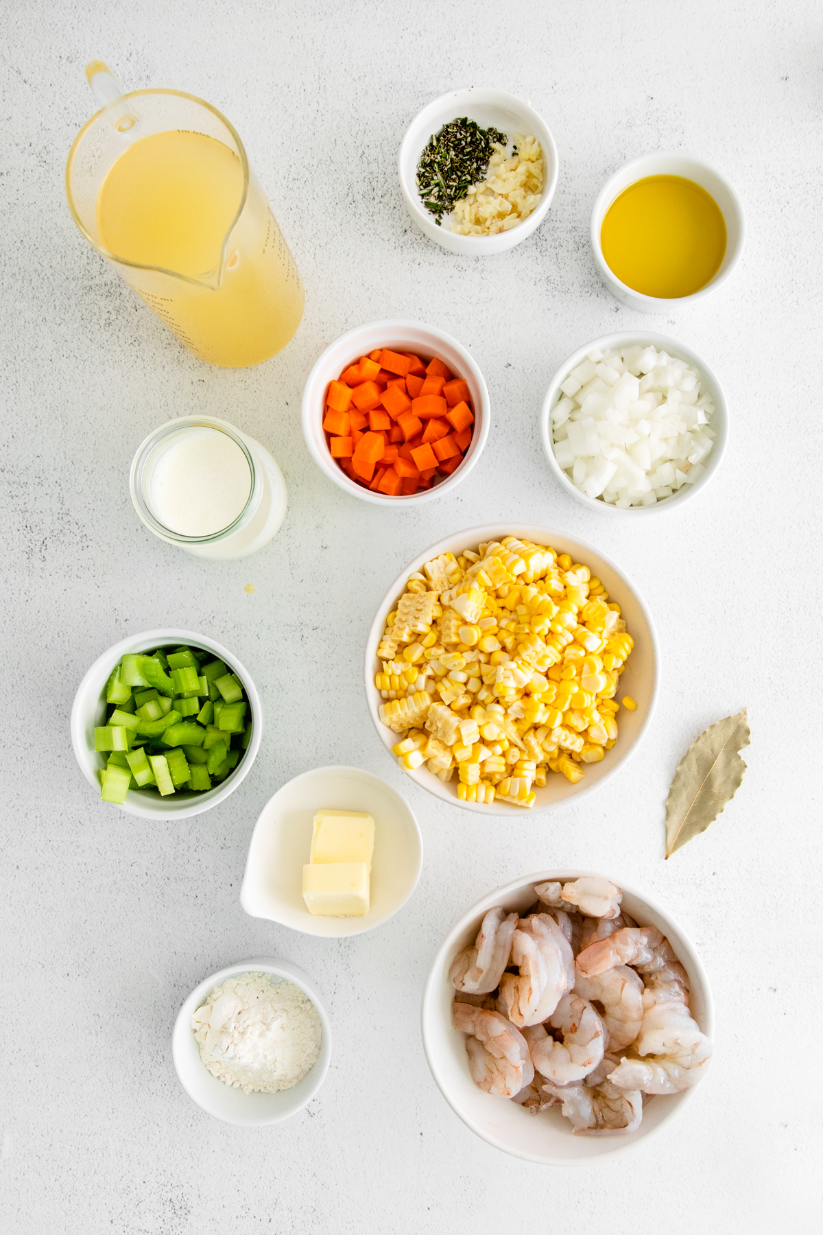 Shrimp Corn Chowder ingredients on a table. 