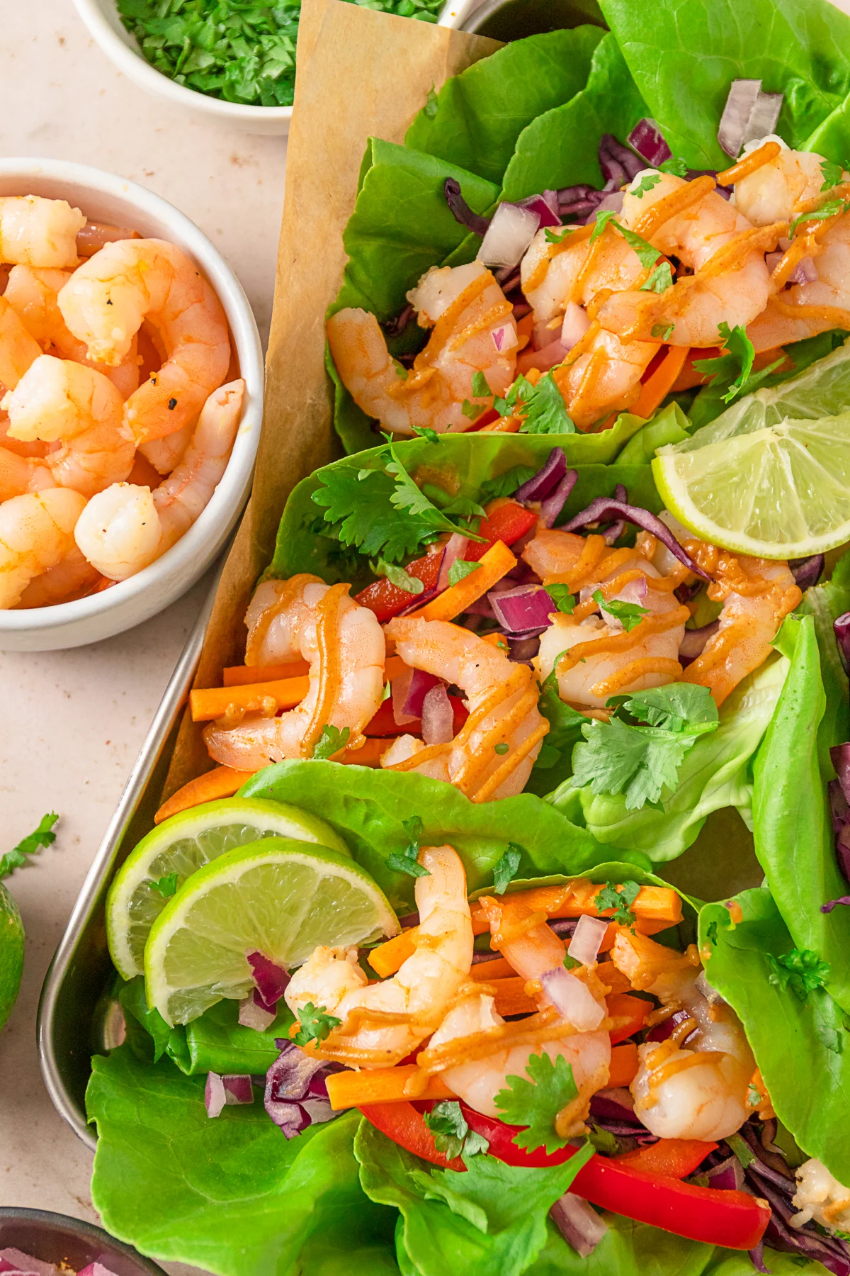 Shrimp Lettuce Wraps with Peanut Sauce on a serving tray. 