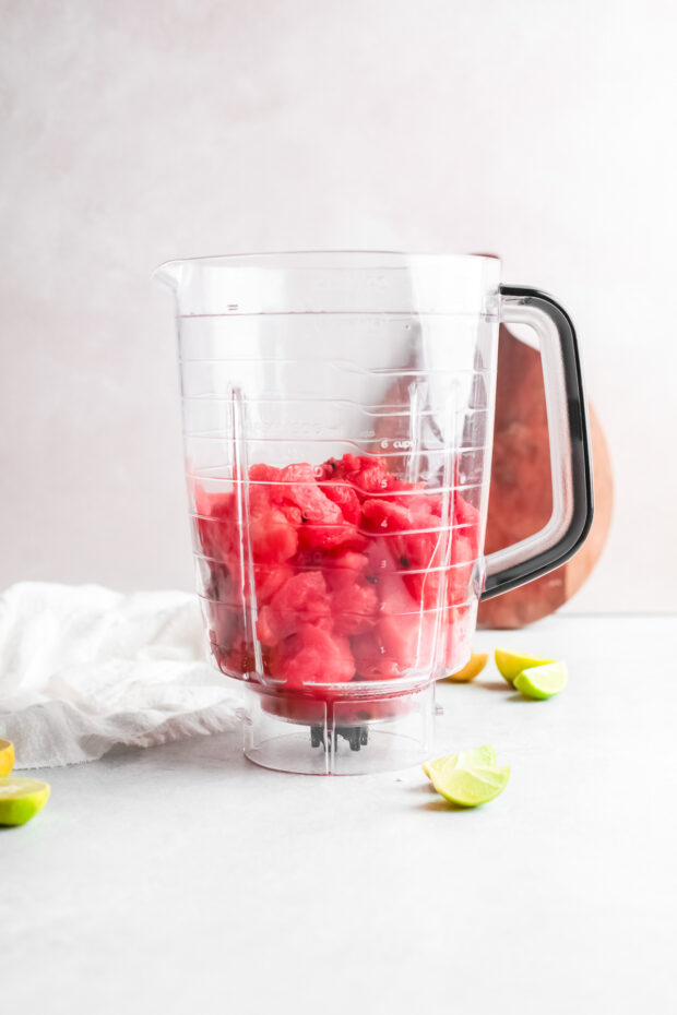 Watermelon in a blender container. 