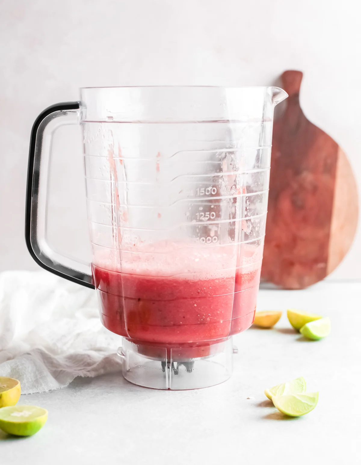 Blended watermelon in a blender container. 
