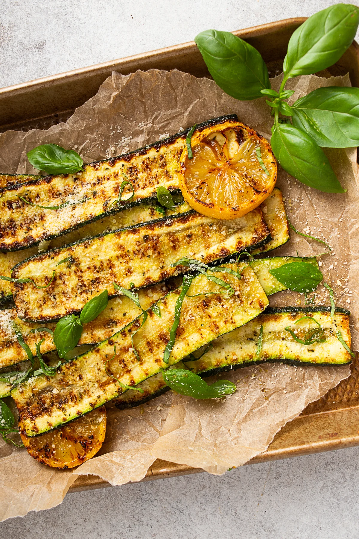 Grilled Zucchini topped with parmesan cheese. 