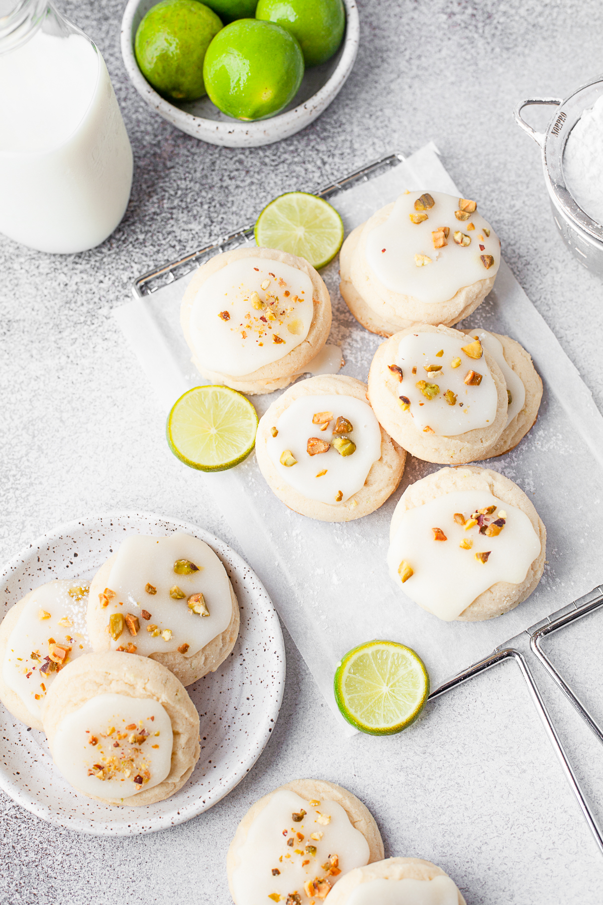 Lime Glazed Sugar Cookies topped with nuts. 