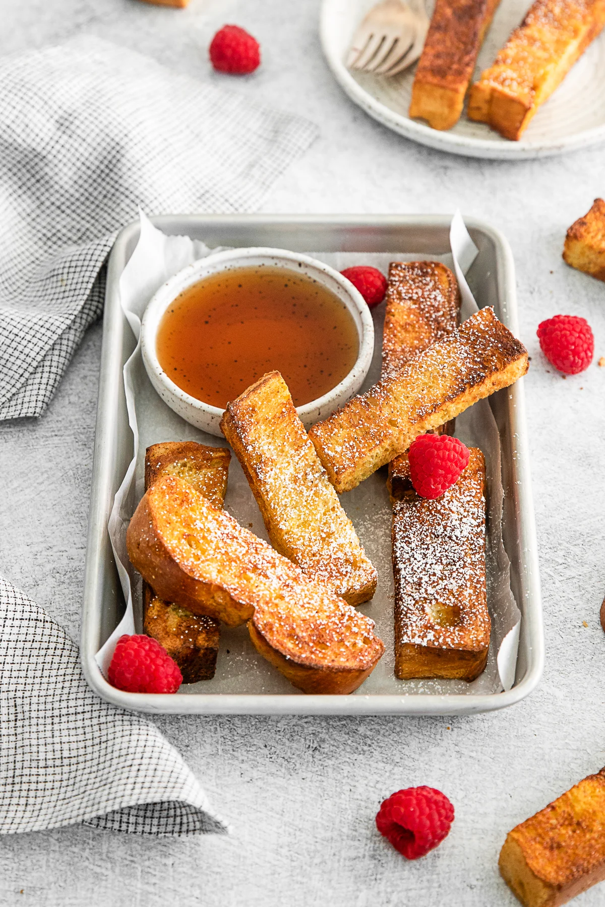 Air Fryer French Toast Sticks on a tray. 