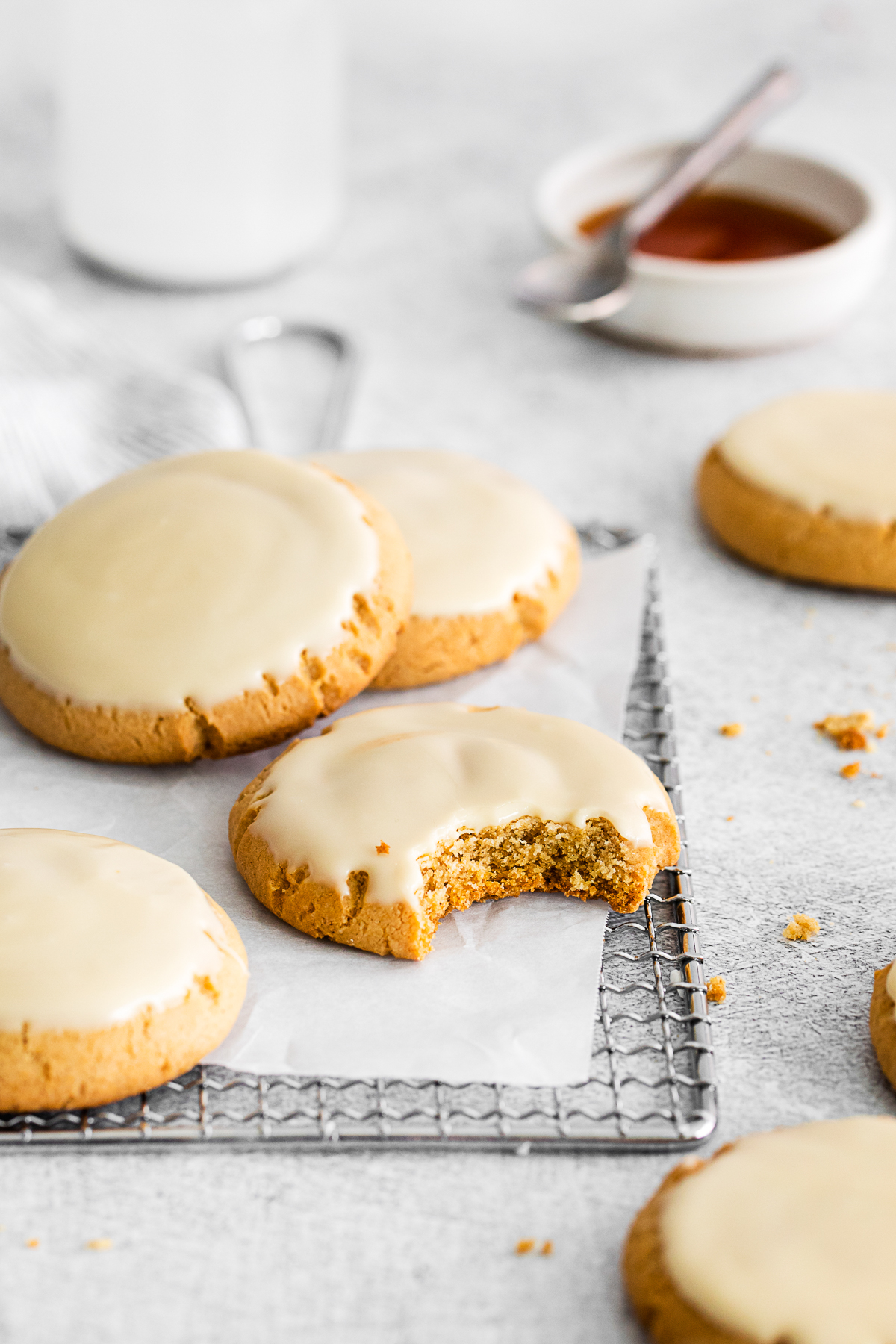 Maple Glazed Cookies with a bite taken out of it. 