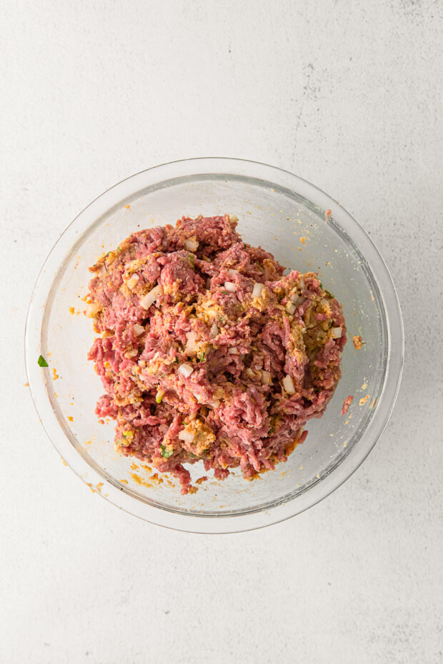 Meatloaf mixed up in a bowl.