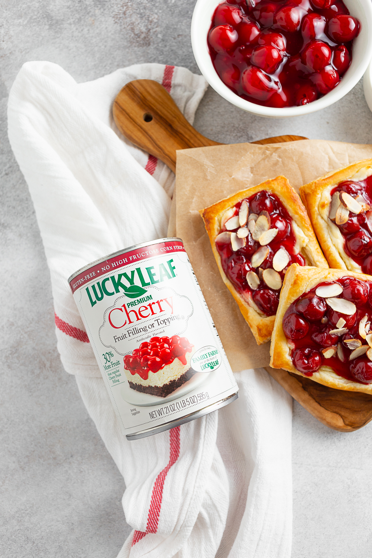 Easy Cherry Danish on a table with a can of pie filling. 
