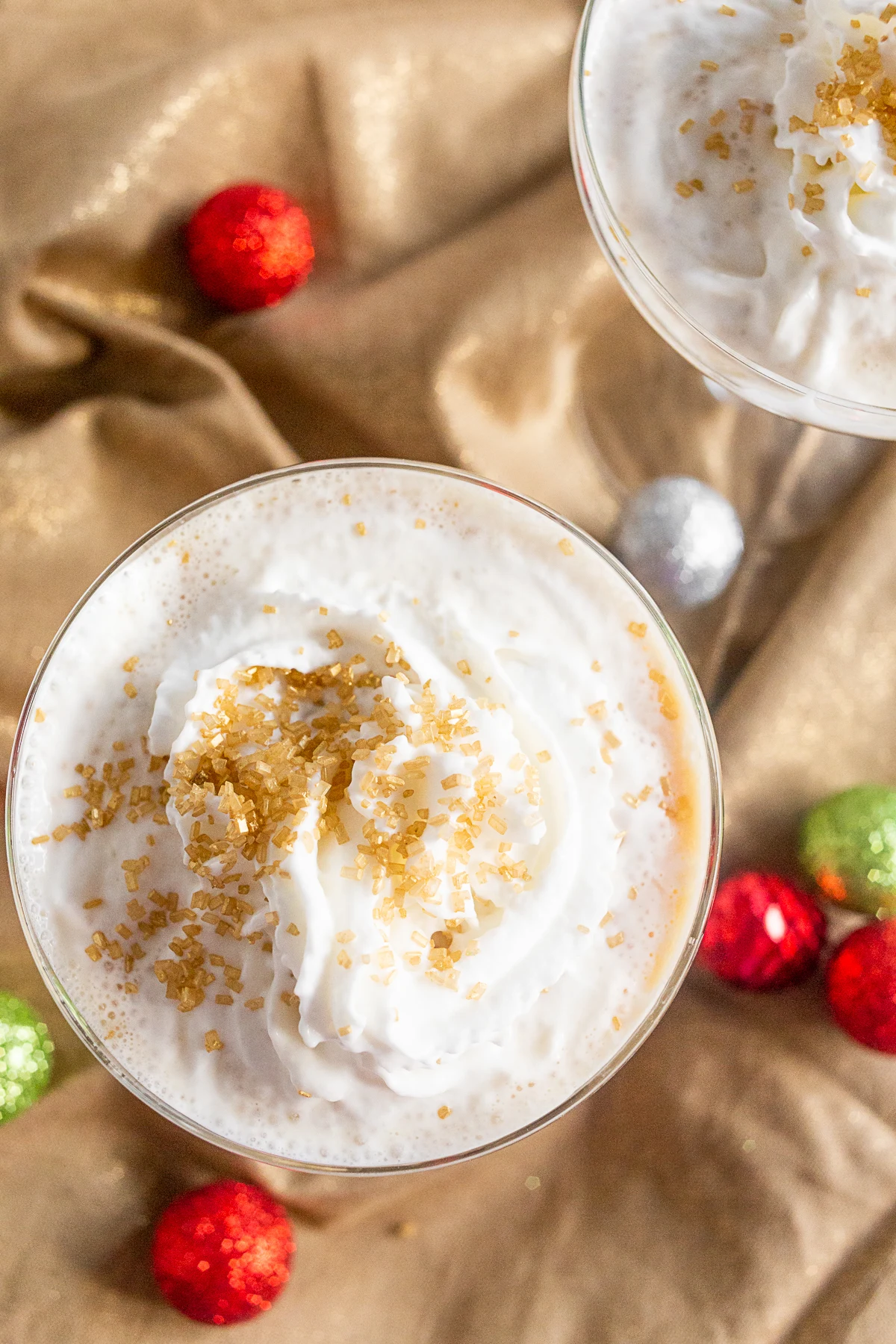 Gingerbread Martini topped with whipped cream. 