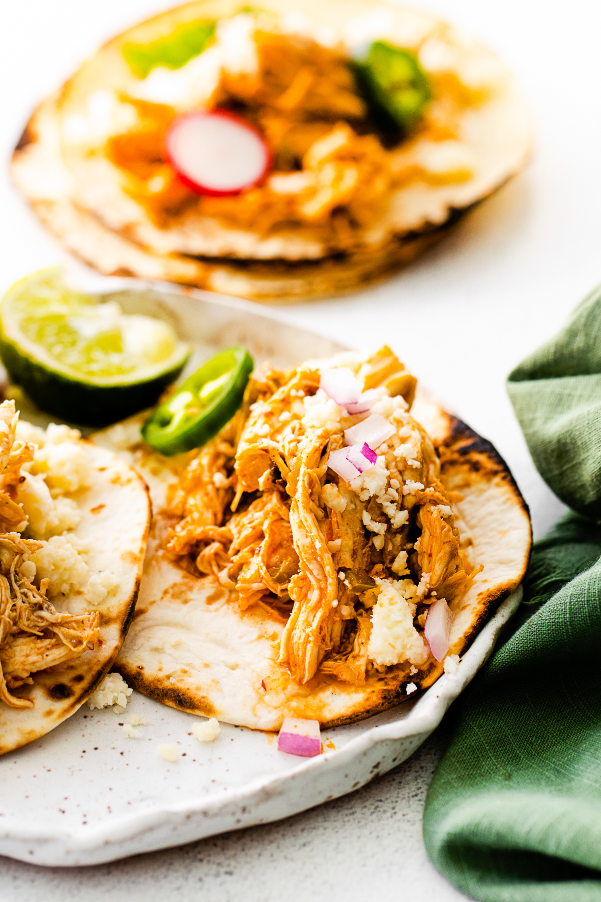 Instant Pot Chicken Tacos on a plate. 