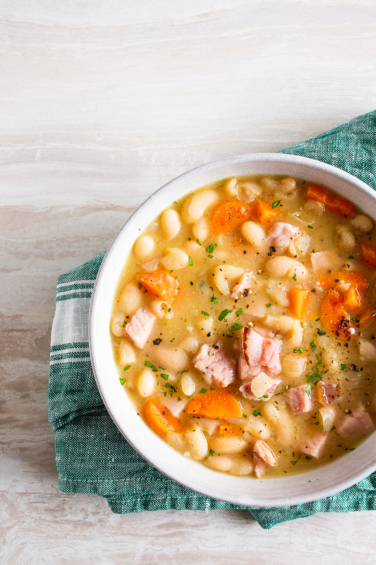 easy ham and bean soup in a ceramic bowl. 