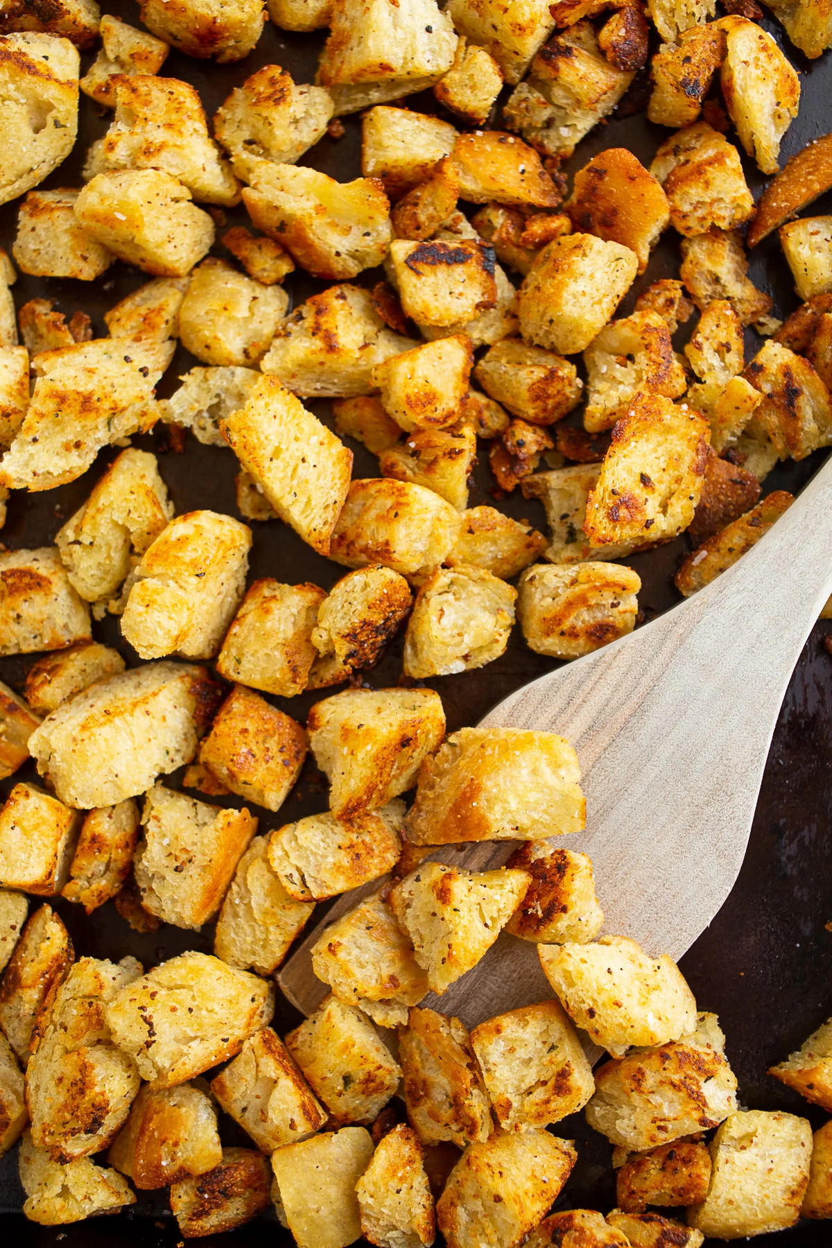 Homemade Croutons with Garlic Butter on a baking pan. 