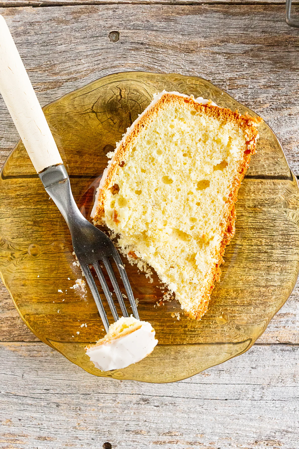 Vanilla Lemon Pound Cake sliced on a plate. 