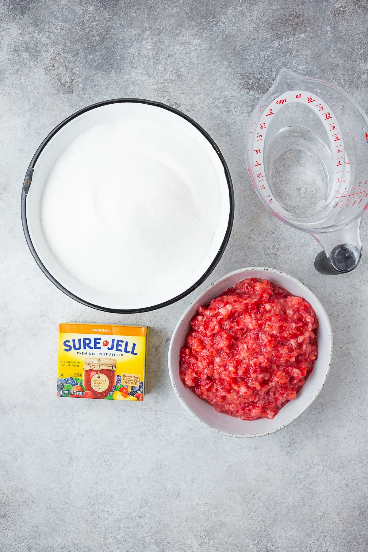 Ingredients to make strawberry jam. 